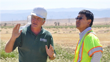 Photo of a USGS California Water Science Center Hydrologist with a partner agency representative