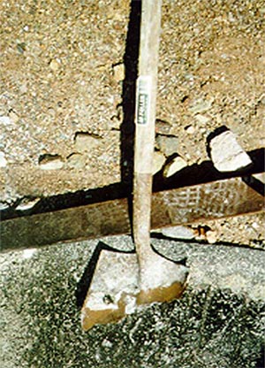 Photo of shovel eroded by acid mine drainage at the Iron Mountain Mine site.