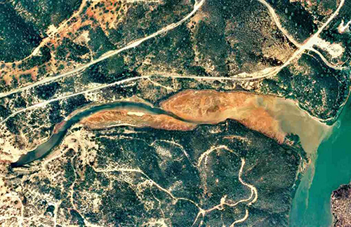 an October 1998 aerial photo for the Spring Creek Arm of the Keswick Dam showing the sediment buildup