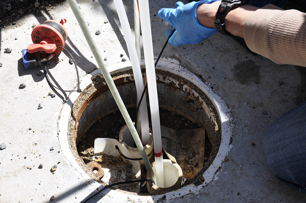 photo of a groundwater well with sampling lines