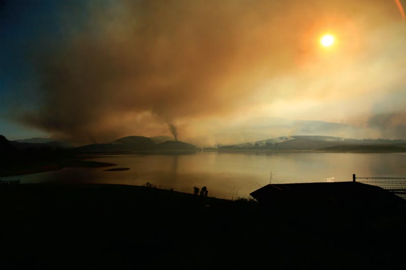 Photo of smoke from the Harris Fire drifting over Sweetwater Reservoir in October 2007.